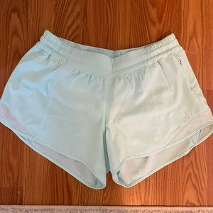 Aqua Lululemon Hotty Hot shorts 4 Inch. size 10